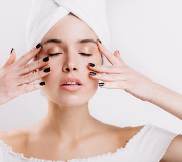 adult woman with healthy skin massages her face prolong youth snapshot girl after shower isolated wall 360x320 - پوستی درخشان